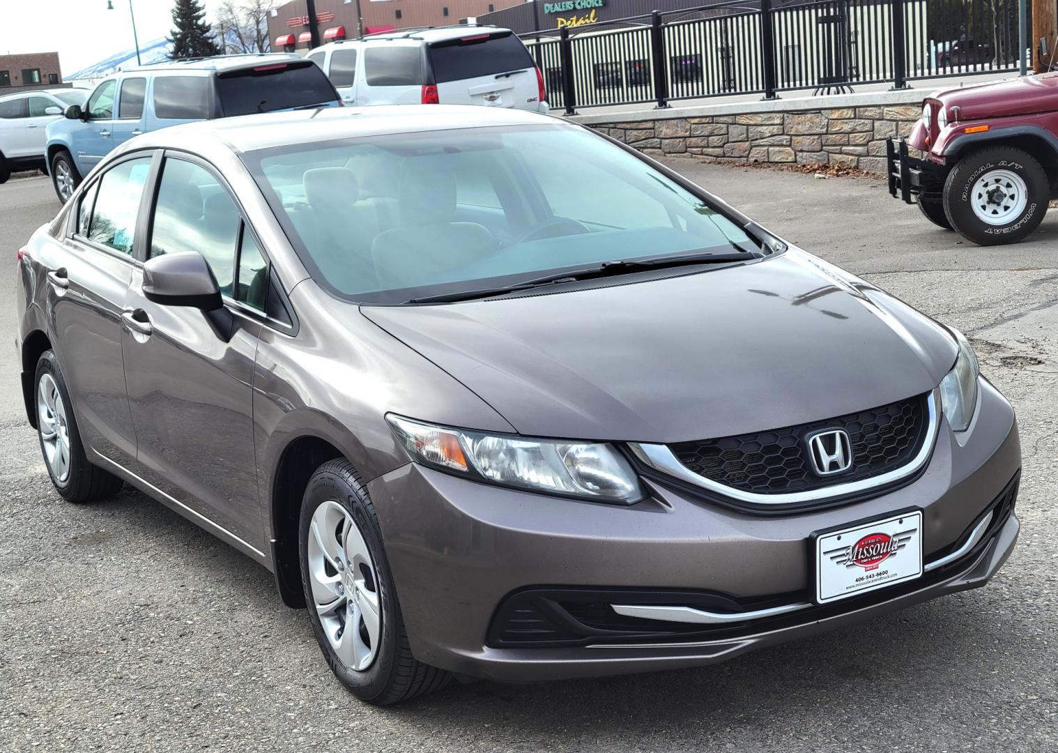 2013 Brown /Tan Honda Civic LX (2HGFB2F57DH) with an 1.8L I4 engine, 5 Speed Automatic transmission, located at 450 N Russell, Missoula, MT, 59801, (406) 543-6600, 46.874496, -114.017433 - Photo#5